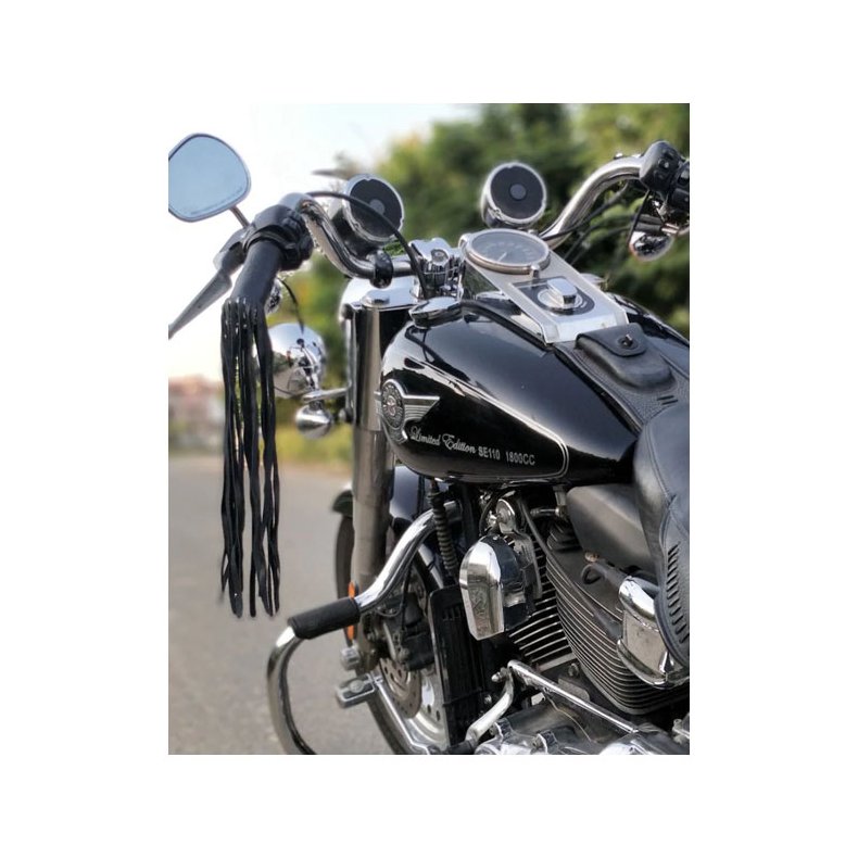 Trip Machine, leather grip tassels