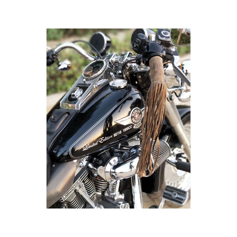 Trip Machine, leather grip tassels